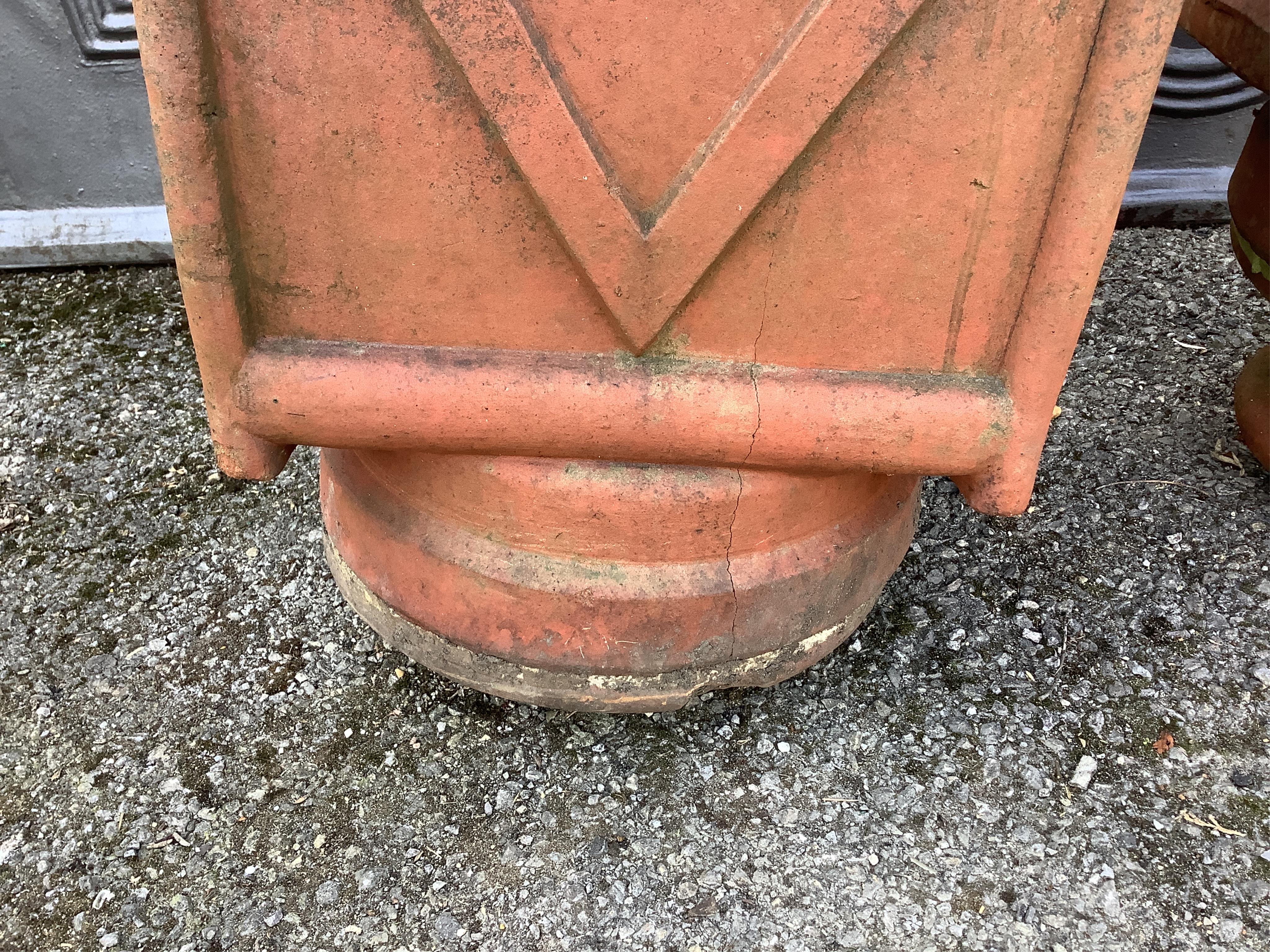 A pair of unusual terracotta chimney cowls, larger height 90cm. Condition - good
